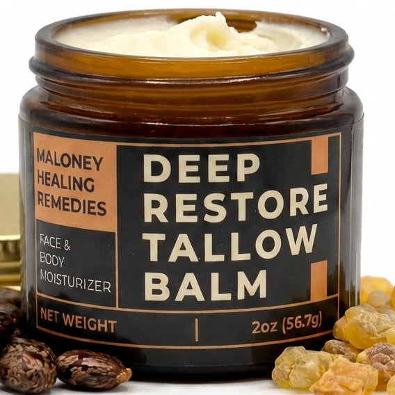 Jar of Deep Restore Tallow Balm with ingredients on a white background
