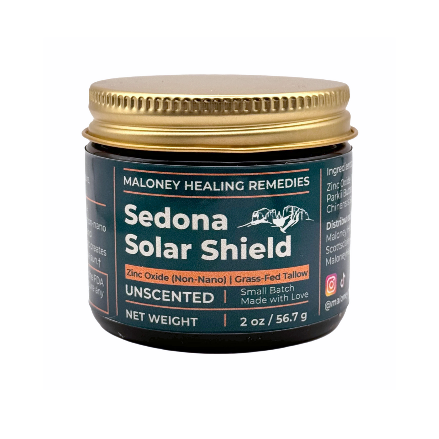 Amber glass jar of Sedona Solar Shield by Maloney Healing Remedies with gold metal lid, labeled as an unscented tallow-based balm with non-nano zinc oxide.