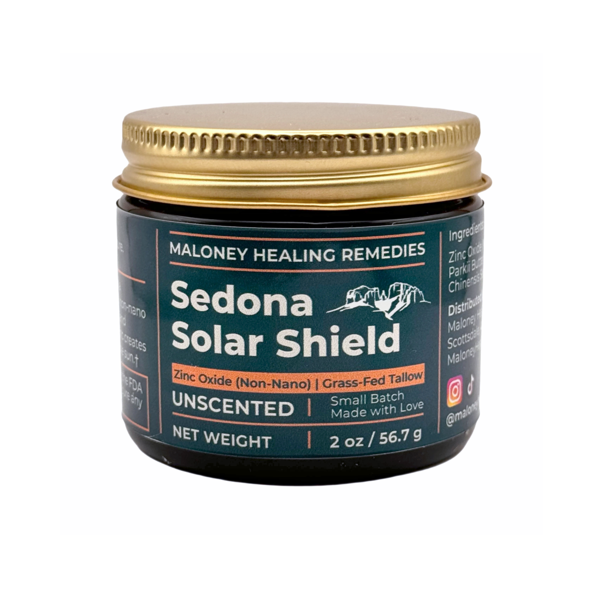 Amber glass jar of Sedona Solar Shield by Maloney Healing Remedies with gold metal lid, labeled as an unscented tallow-based balm with non-nano zinc oxide.